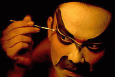 Image: Actor applying make-up - Click to Enlarge