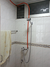 Image: The shower only Yee Lo uses + his towel - Click to Enlarge